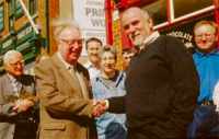 photograph: President Frank Atkinson welcomes Chair John Grundy.